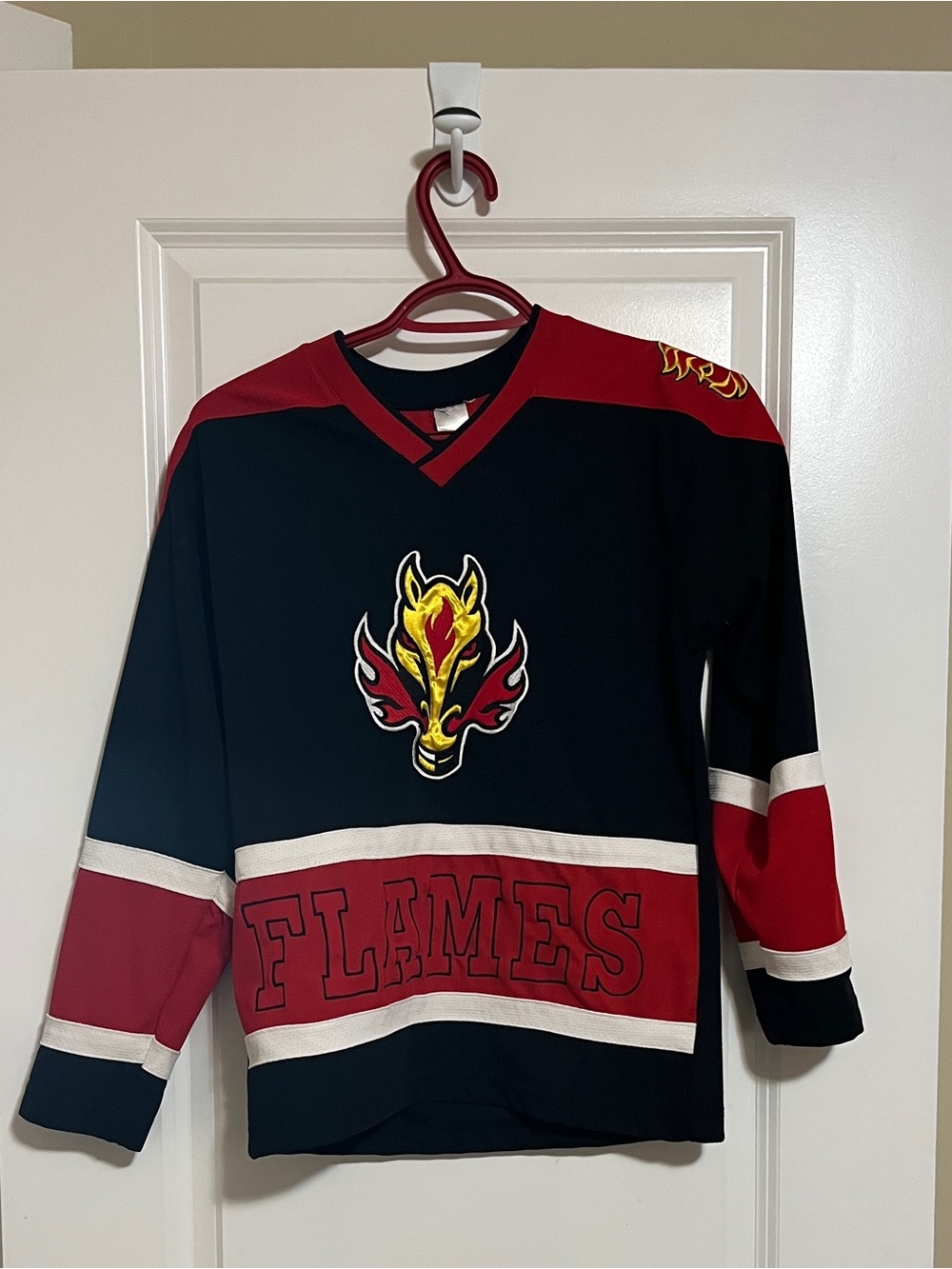 Red & Black Plaid Hockey-Style Jersey with Flame Chest Detail